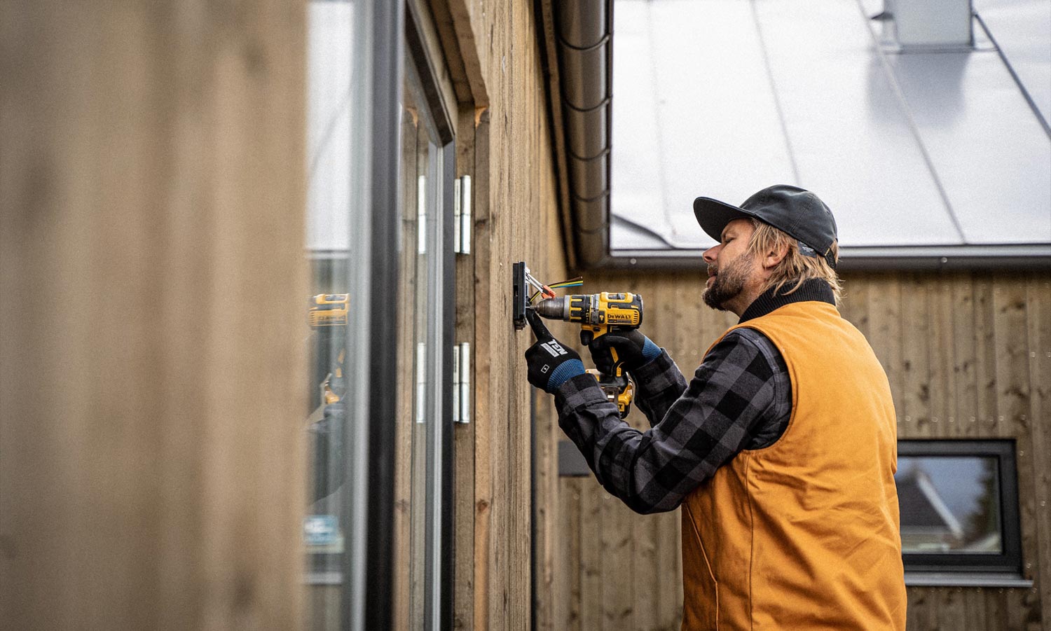 Electrician installing new outdoor lights